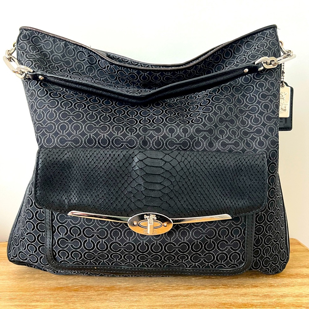 Like New. Coach Purse with Teal Lining.